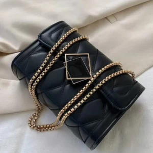 Black quilted chain shoulder handbag with geometric buckle